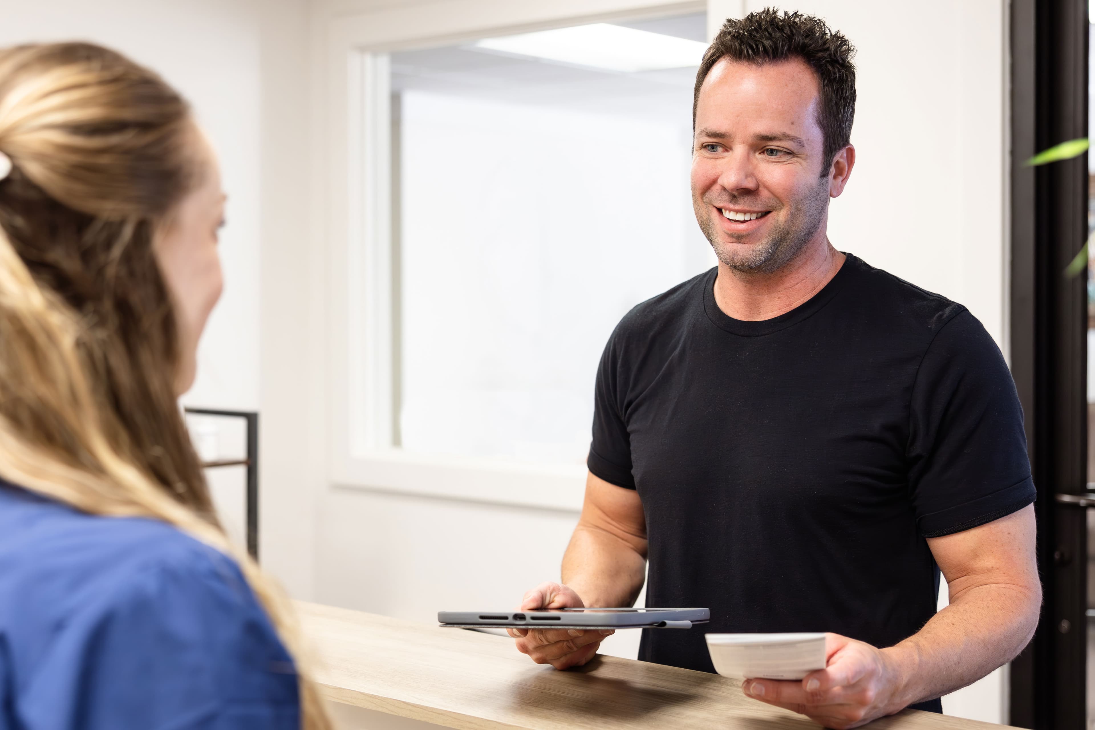 Man receiving sexual health treatment information at Avara Medical in Provo, Utah