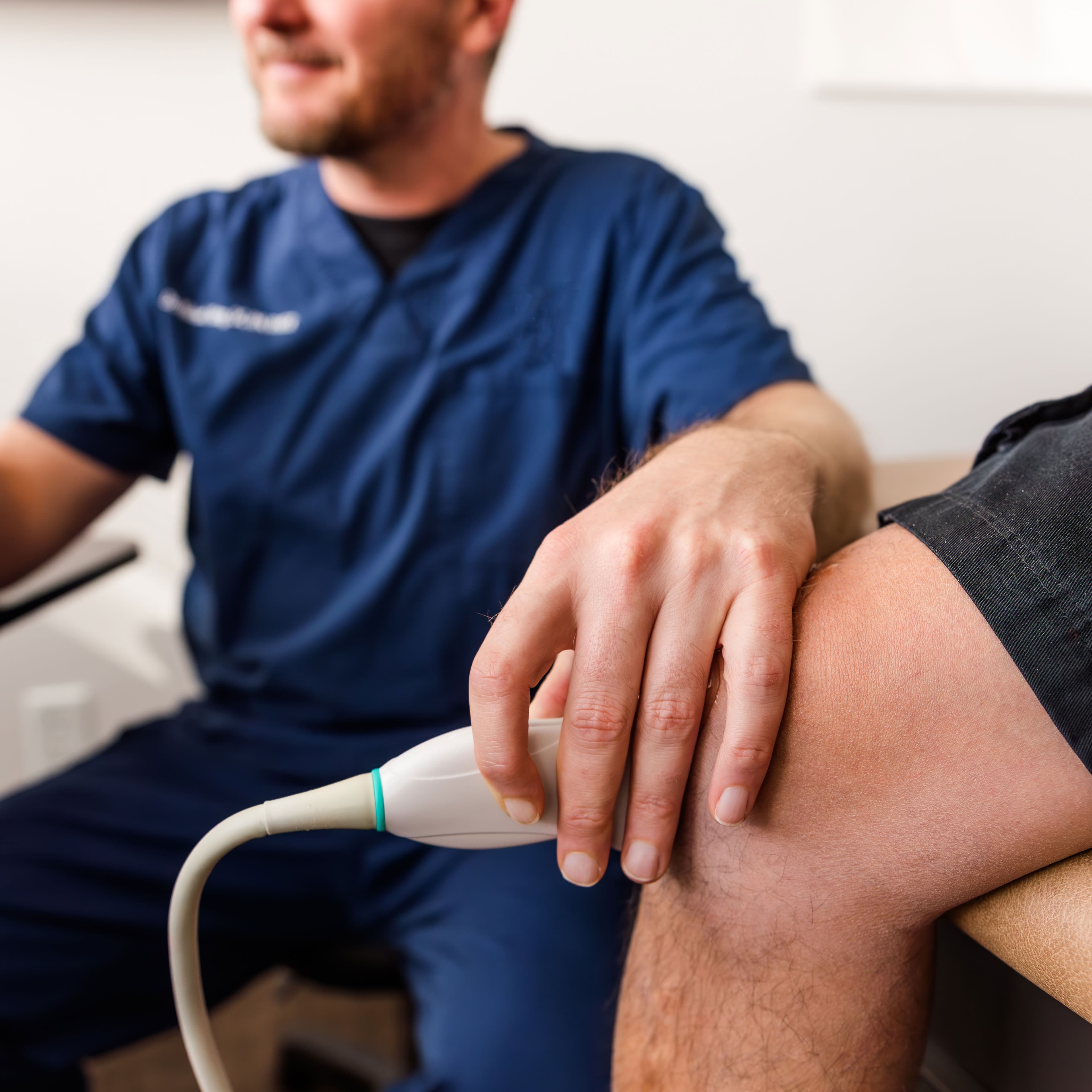 Ultrasound-guided therapy on a knee at Avara Medical