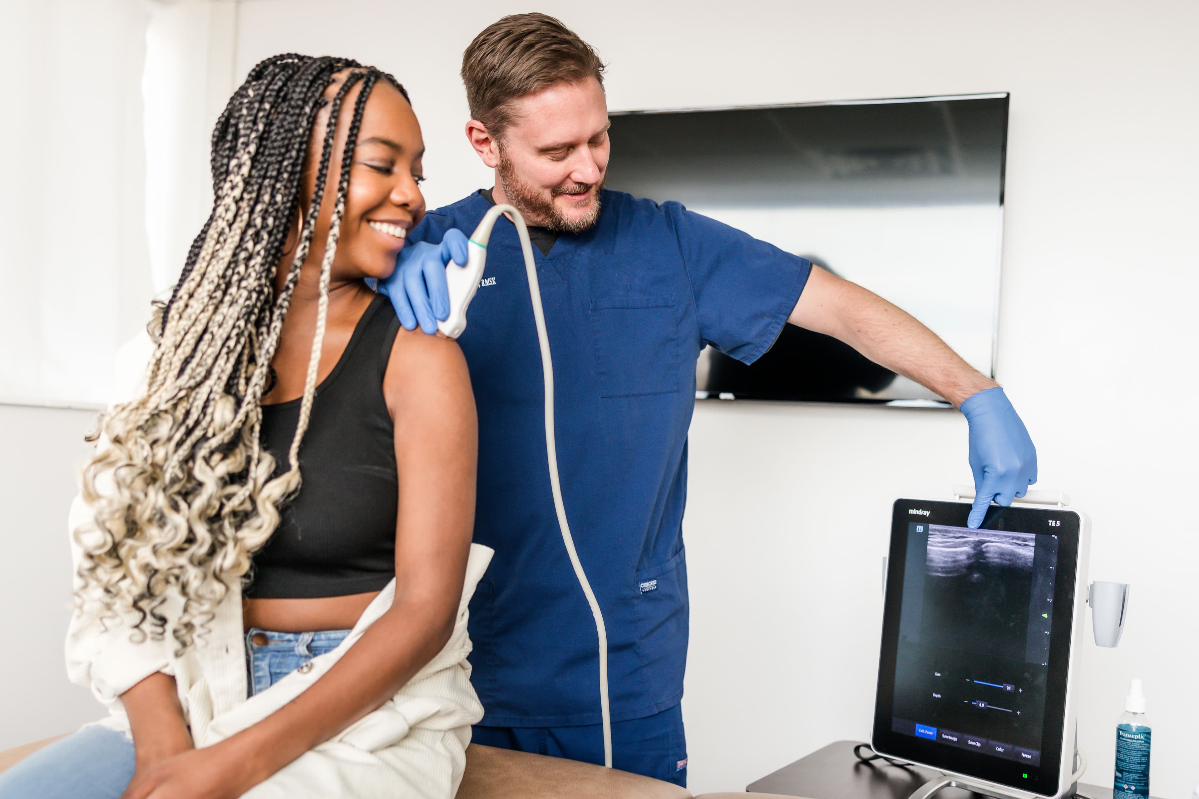 Woman receiving Ultrasound-guided therapy at Avara Medical